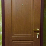 Дверь с отделкой МДФ панелями в квартиру